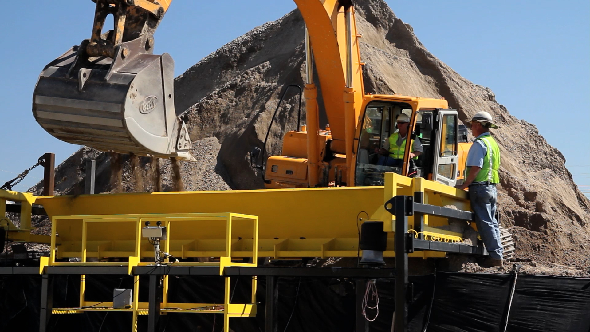 Earth movers filing Trap Bags